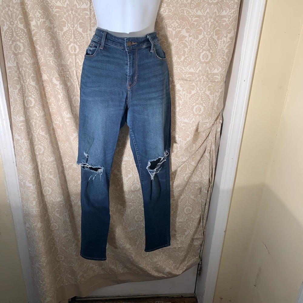 Women ripped jeans.